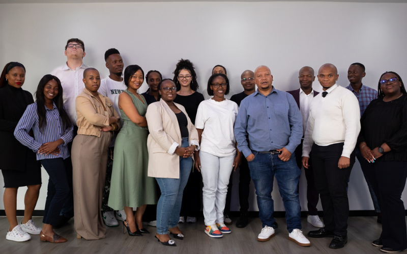 Bottomline IT team group photo showcasing diverse professionals in Gauteng office.